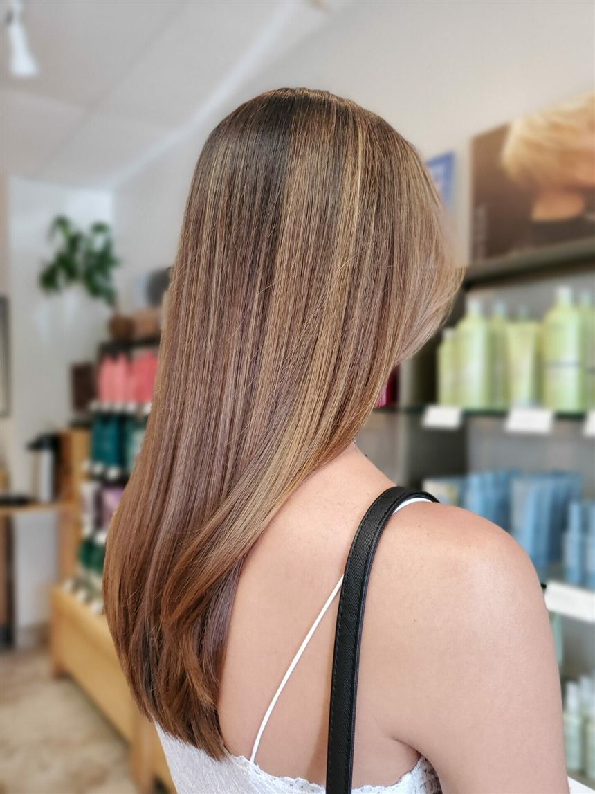 Full highlights hair color example showing bright dimensional color